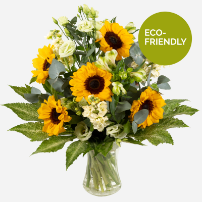 Sunny Spells  - Sunshine, showers and beautiful flowers … The magnificent sunflower with an attendance of beautiful blossoms to complement, upheld with bright foliage.