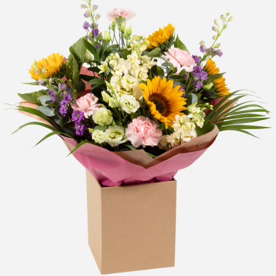 Bright Ideas Flower Bouquet - Beautiful Sunflowers and a peppering of other summer flowers and foliage. Tied in water and presented in a stylish bag. An amazing bouquet full of joy and delight ready to display and enjoy. These flowers will be hand delivered by the local florist.