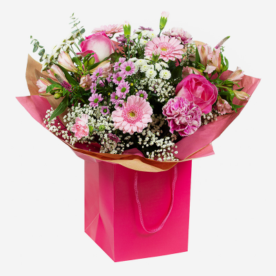 Rosemary - A pink themed hand-tied created in a complimentary gift bag or box. A special gift they’ll remember for years to come.